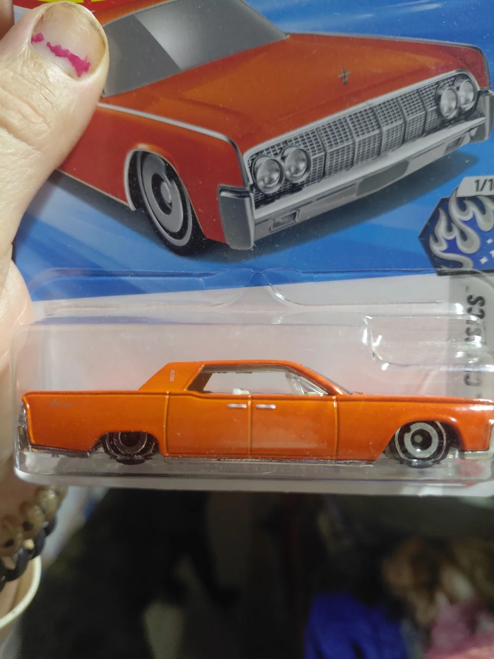 orange Hot Wheels '64 Lincoln Continental from the 2026 mainline series featurin